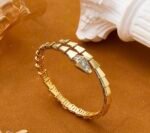 Elegant Geometric Gold Cuff Bracelet - Image 2